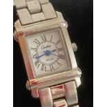 Ladies wristwatch in full working order. Thought to be a facsimile. Stainless steel bracelet.