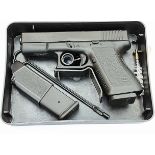 A GENUINE GLOCK 9mm SEMI-AUTOMATIC PISTOL (DEACTIVATED) DROP OUT MAGAZINE AND DRY FIRING ACTION,