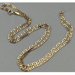 A 9K Yellow Gold Flat Curb Link Necklace. 50cm. 5.21g.