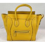 A Celine of Paris Large Yellow Phantom Handbag. Bright vibrant yellow leather. External zipped