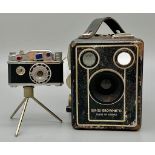 A Vintage Brownie D Camera in Case plus a Vintage camera novelty table lighter! A/F