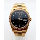 An 18 K yellow gold, gents, ROLEX DAY-DATE OYSTER PERPETUAL watch. 36 mm dial, black face with