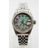 A ladies, ROLEX DATEJUST watch. Stainless steel, 26 mm dial with diamonds on mother of pearl face.