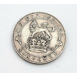 A 1923 Silver Sixpence Coin. Good fine. Obverse - Bare head of King George V facing left, with the