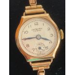 Ladies Vintage 9 carat GOLD Benson wristwatch, having gold case together with 9 ct gold bracelet,