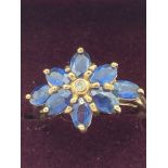 Beautiful 9 carat GOLD, SAPPHIRE and DIAMOND RING, having diamond point to centre with an eight