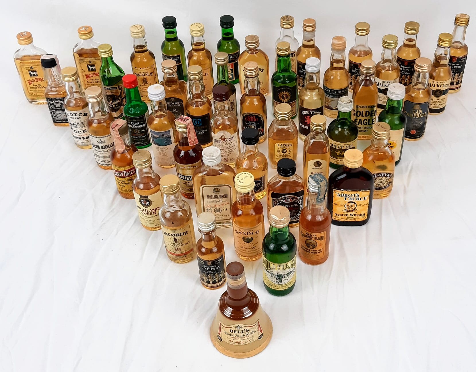 A Wonderful Collection of Fifty Miniature Bottles of Whisky. All are unopened - some are rare.