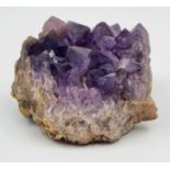 A quality Amethyst specimen. Large natural crystals with strong colouration in very good