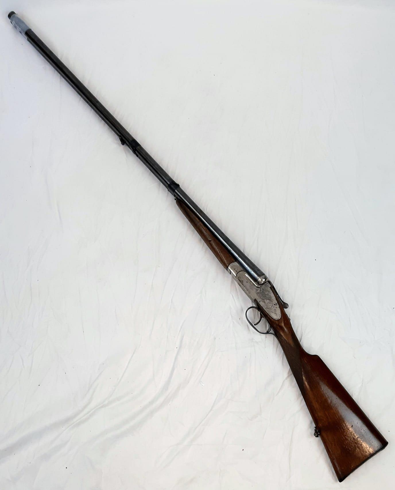 A Deactivated Eibar Double-Barrelled Side-Lock Shotgun. 16 bore calibre with a 31.75 inch barrel