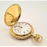 An Antique 18K Gold and Enamel Full Hunter Waltham Pocket Watch. White dial with sub second dial.