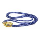 Rare Dual Strand Blue Sapphire Necklace, with a Gold plated clasp embedded with Tourmalines. 47.