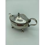 Antique SILVER mustard pot with blue glass liner and silver shell bowl spoon. Standing on four