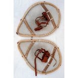 A Pair of Vintage Hand-Crafted Innuit Snowshoes from Newfoundland and Labrador. 58 x 40cm.