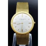 A VACHERON & CONTANTIN 18K GOLD GENTLEMANS SLIMLINE MANUAL MOVEMENT SOLID GOLD STRAP. 32MM