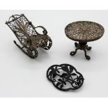 Solid silver (tested) filigree doll house chair and table together with Japanese floral brooch. 25.6