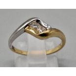 A 9K White and Yellow Gold Cross-over 2 Diamonds Ring. Size O. Total weight: 1.68g