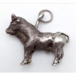 Vintage solid silver bull figure in the form of a pendant. Hallmarks for London 1927 with makers