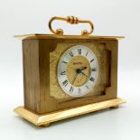 Small Swiza Gilded Carriage Clock. In working order. 12 x 8cm.