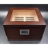 A quality cigar humidor with cedar wood tray and hydro-tray for 25-50 cigars. Felt lined accessory