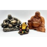 Three Buddha Figures. Wood, resin and metal-cased. Tallest Buddha -18cm.