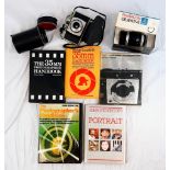 A Mixed Photography Lot: A Kodak Brownie camera, five 35mm photography books and two Pentacon