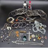 Job lot of costume jewellery, bracelets, pendants, necklaces, bangles and more. Few are silver.