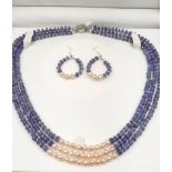 A very elegant, three row of faceted tanzanite and genuine pink pearls necklace and earrings set