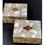 A vintage pair of Asian (probably Thai) Mother of Pearl boxes. Dimensions: 9.5 x 7.5 x 4 cm