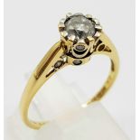 An 18K Yellow Gold with a 0.35ct Diamond solitaire Ring. Size S. 3.4g