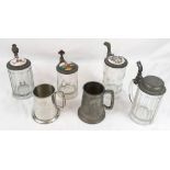 Four Antique German Glass, metal and Enamel Beer Steins. Different shapes and size from a pint to