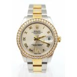A ROLEX MID SIZE OYSTER P;ERPETUAL DATEJUST IN BI-METAL WITH A SILVERTONE DIAL AND DIAMOND BEZEL,