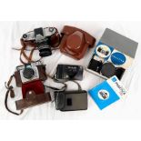 A Selection of 35mm Cameras. To include: Praktica IVF, Ricoh, Praktica VLC and an Ilford