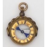 Antique yellow metal compass pendant with loop attached. 3.5cm x 2.5cm. Weight: 5.8 grams.
