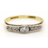 A VINTAGE 18K YELLOW GOLD RING WITH A DIAMOND BRIDGE SET IN PLATINUM ART DECO PERIOD. 2.03gms size O