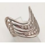 A 14K White Gold Diamond Chevron Ring. 0.30ct. Size O. 4.38g