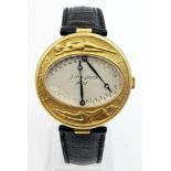 A VERY UNUSUAL AND DISTINCTIVE 18K GOLD WATCH BY J.OP DE BEECK WITH INDIVIDUAL MINUTE AND HOUR HANDS