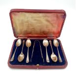 An Antique Solid Silver Teaspoon Set with Sugar Nips. Hallmark for Sheffield 1911. Makers mark of
