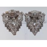 A Sensational Art Deco Style Pair Of 18K White Gold and Diamond Lapel Clips. Over 7ct of brilliant