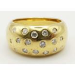 AN 18K GOLD AND DIAMOND RING. 11.6gms size P