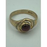 9 carat GOLD GARNET CABOCHON RING having polished Garnet cabochon solitaire set to top with