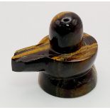 A 71g Tigers Eye Carved Shivling Statue. 4.5cm