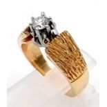 0.39 carat diamond claw set in a 18K yellow gold ring. This is a 1980's stylised ring. Size M.
