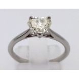 A .83CT HEART SHAPED DIAMOND SET IN A MODERN PLATINUM SETTING. 3.5gms size L/M