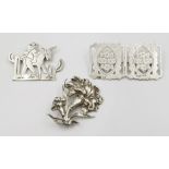 Early solid silver three brooches. Mexican man with donkey is hallmarked 925, 5.5cm. One is