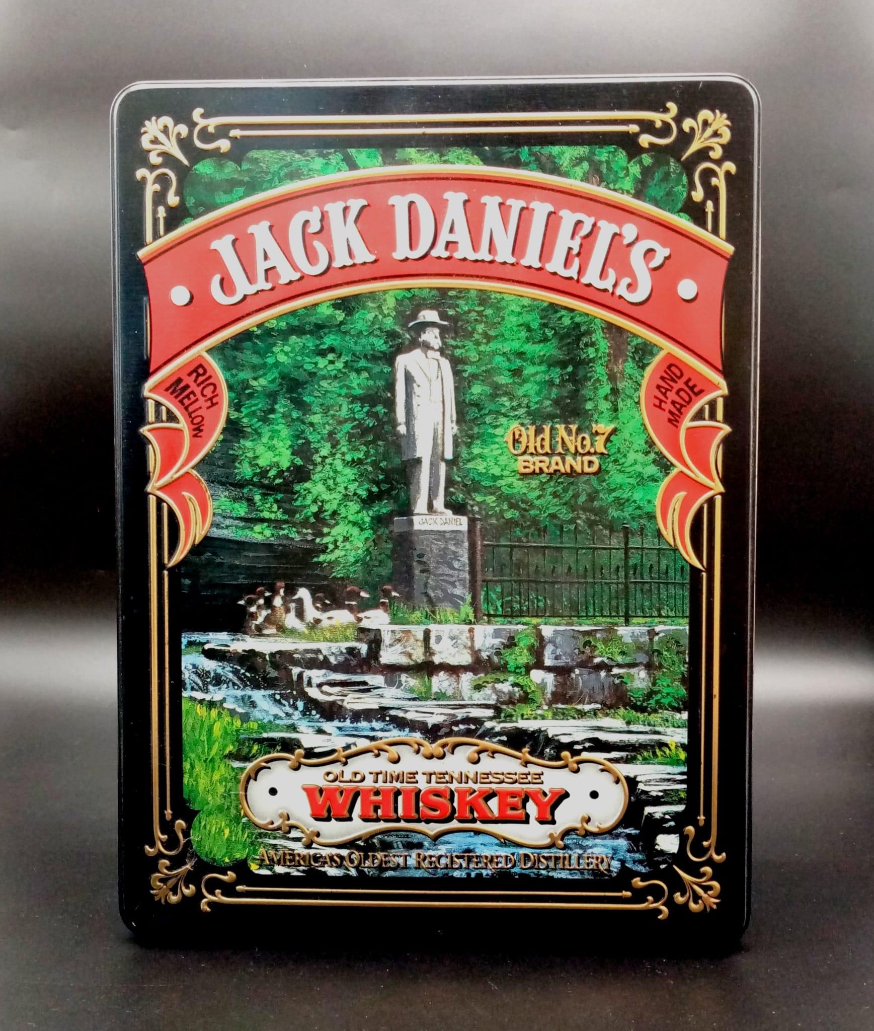 A Collectable Jack Daniels Tin with Two Solid Shot Glasses and an Empty Bottle of Jack!