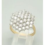 A Glorious 18K Yellow Gold 2ct Diamond Ring. 40 bright diamonds complete this hexagonal masterpiece.