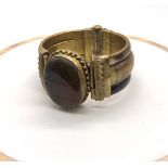 A Vintage Agate and Brass Statement Bracelet. Large oval central multi-coloured agate cabochon - 4 x