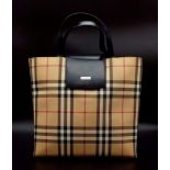 A BURBERRY handbag with original protective cloth bag. Appr. dimensions: 27 x 11 x 27 cm. Ref: 9396