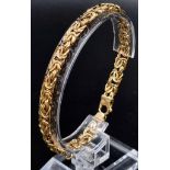 An Italian 9K Yellow Gold Entwined-Link Bracelet. 18cm. 7.12g total weight.