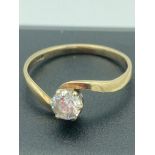 9 carat GOLD crossover style RING having round cut (0.5 carat) crystal quartz SOLITAIRE set to